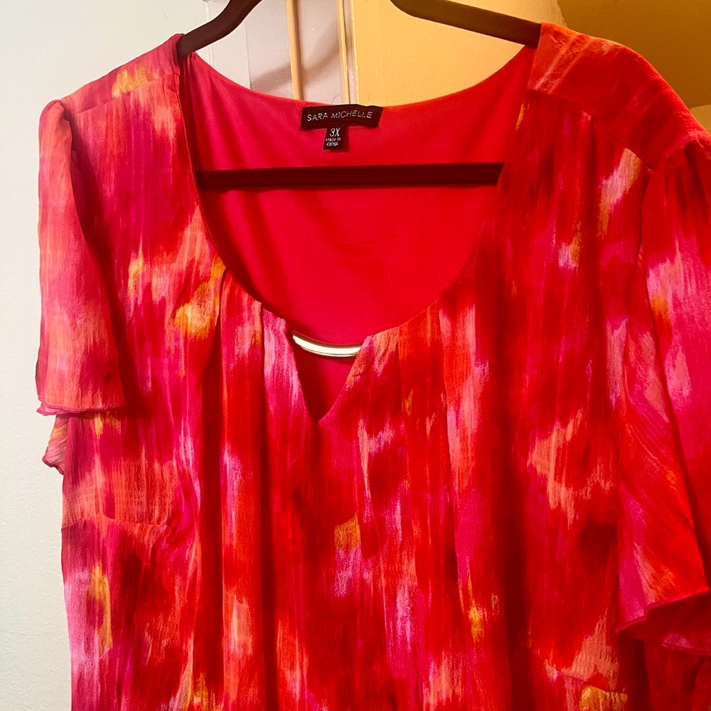 Cute flowy blouse, new with no tags, never worn!